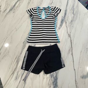 Bebe Black and White Striped V-Neck Tee with Blue Trim and Matching Shorts.